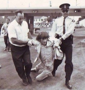 Peter Kormos knew what it meant to be dragged away by police. Here he was being busted during a protest to save the right of the public to walk along the beaches of Lake Erie. . Doesn't that fight still sound familliar? File photo courtesy of Peter Kormos's collection.