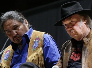 Canadian First Nations Chief Allan Adams at a recent media conference with rock artist Neil Young on the  bad road Canada is going down with the tar sands.